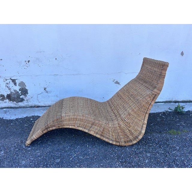 Designed by Carl Öjerstam for IKEA in the 1990s, this natural rattan lounge chair captivates with its fluid, minimalist,...