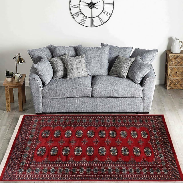 Transform the interior of your home with a beautiful hand-knotted Bokhara rug. Meticulously crafted with intricate...