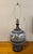 Mid century sgraffito pottery lamp incised with folk art style birds and antelope type animals, with textural pattern...