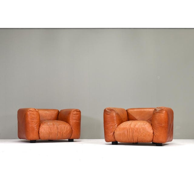 The Marius & Marius lounge chairs and sofa were designed by the Italian architect and designer Mario Marenco in 1970. He...