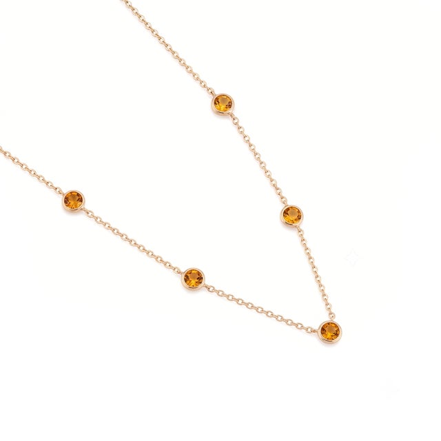 Add a touch of radiant elegance to your collection with this stunning station necklace. Designed for the modern...