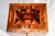A remarkable example of nineteenth-century craftsmanship, this large Victorian inlaid wood box is a true statement piece,...