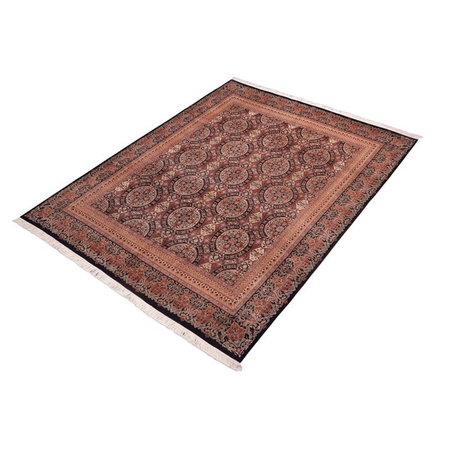 Designed with mesmerizing intricacy and gorgeous color palette, this hand-knotted masterpiece demonstrates the beauty and...