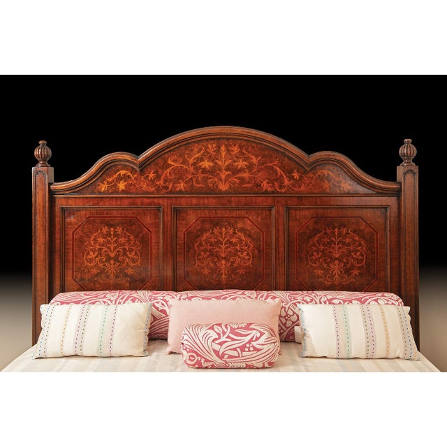 Handcrafted in Italy from solid walnut, this Eastern King bed features a striking headboard adorned with intricate inlays...