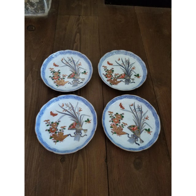 Pretty group of four early 20th century Japanese porcelain plates.