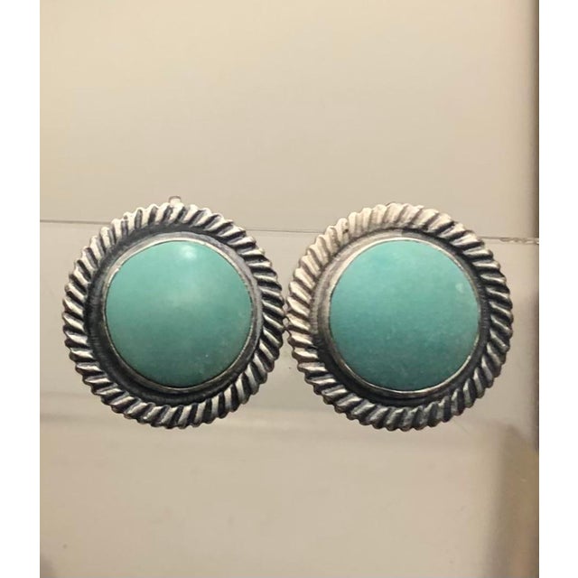 These lovely 1940s Turquoise and Sterling Cabochon Earrings will soon become a “go to” staple in your vintage jewelry...