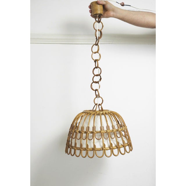 Vintage rattan bell pendant lamp with a bentwood cane frame, looped rattan chain and soft textured Japanese mulberry paper...