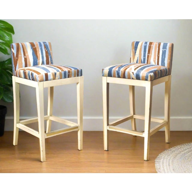 1970s comfortably padded stools with cushions seats and back, brass foot rest, solid wood painted cream white....
