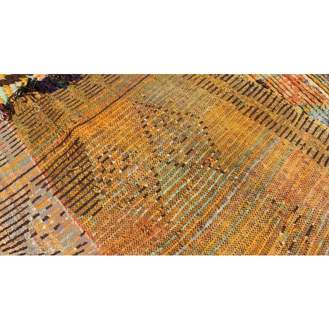 Mid 20th Century Long Vintage Moroccan Runner With Tribal Design in Orange, Brown, Blue and Green For Sale - Image 12 of 13