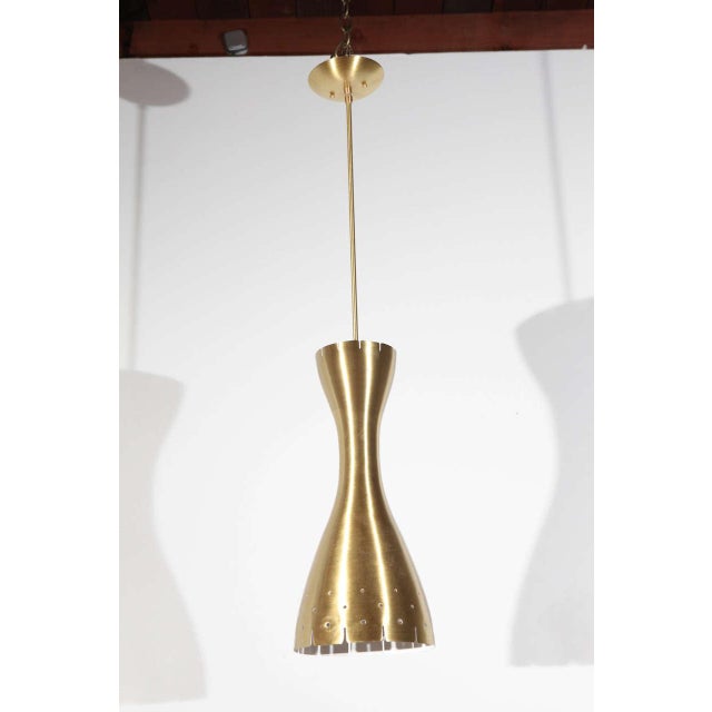 Old stock spun aluminum pendant with anodized brass plating. Newly rewired for one standard lightbulb.