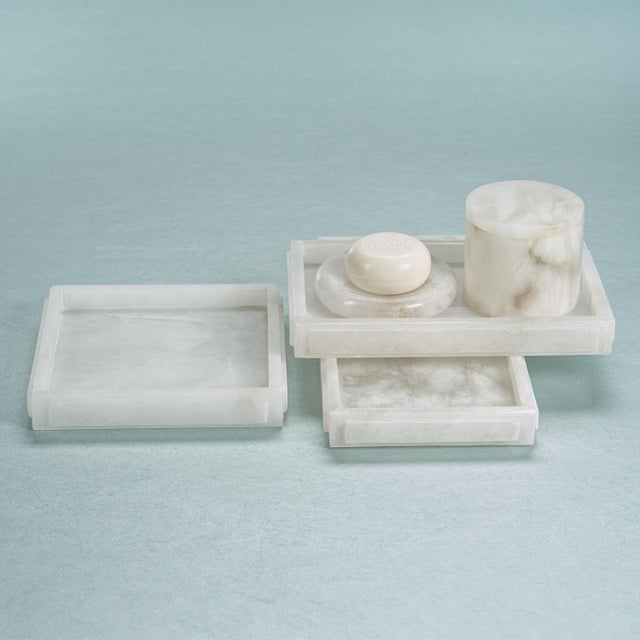 Arrange your beauty essentials into a stunning display of products by bringing home this alabaster vanity tray. This tray...