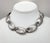 1950s rhodium plated oval Florentine finish links collar necklace with hook clasp. Marked "Napier." Center link: 3/4...