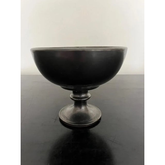 This pretty ceramic bowl on a stand is signed by the versatile artist Jean Marais. An endearing character with an...