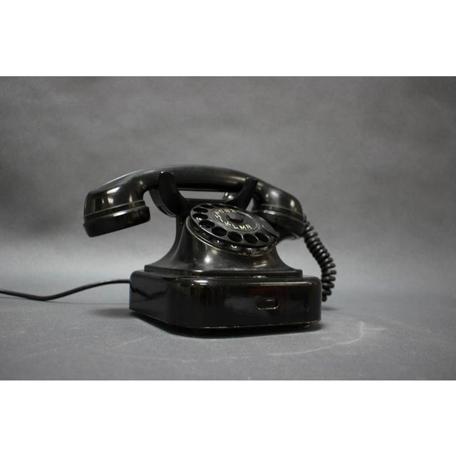 - Mid-Century Bakelitte Rottary Telephone by Tesla, 1950s, - made of bakelitte, - shows signs of wear and age (scratches,...