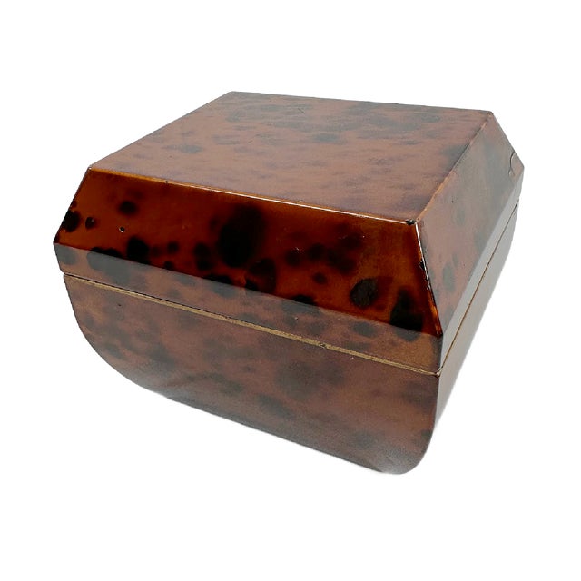 This is a charming faux tortoise Trinket box. It was produced for by The Halden Group in the last 80's to 90's in Japan....