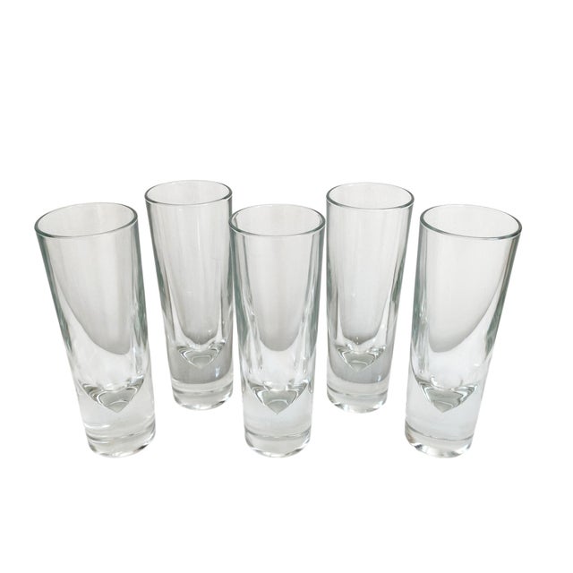 Elevate your drinking experience with the Carlo Moretti Bullet Highball Glasses, a stunning set of five that combines...