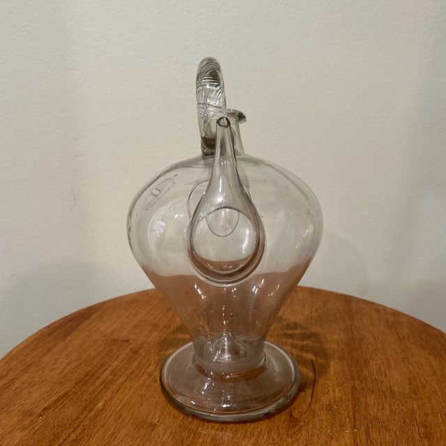 This distinctively Catalan form of communal drinking vessel evolved during 19th century although the very fine show here...