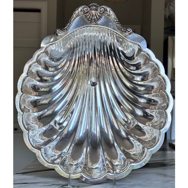Presenting a large-scale serving bowl by English Silver Manufacturing Corporation, Made in U.S.A. This piece is a part of...