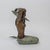 Mid-century cast bronze sculpture depicting a mermaid holding a large conch shell. Designed as a fountain figure with a...
