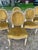 Set of 6 19th Century Louis XVI Dining Chairs featuring hand-carved and painted wood frames with elegant oval backs,...