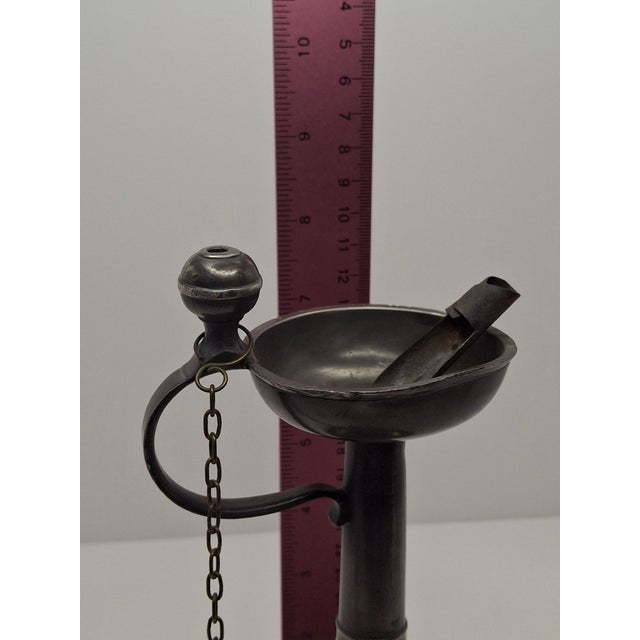 This is a rare and historically significant 18th-century pewter spout lamp, featuring the prestigious Bremen "Key in...