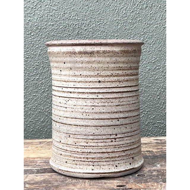 Add a touch of organic warmth to your interior with this exceptional original studio pottery vase. Expertly hand-thrown,...