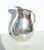 Handmade hammered silver pitcher from Industria Argentina, Italy. Hammer in a very tiny pattern of overlapping marks to...