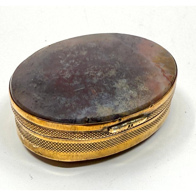 3 beautiful antique Victorian snuff or trinket boxes with gilt metal or brass sides and banded or moss agate tops and...