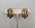 1948 goldtone with raised center and chevron design clip earrings. Marked crown "TRIFARI" on the clips and "PAT PEND COPR"...