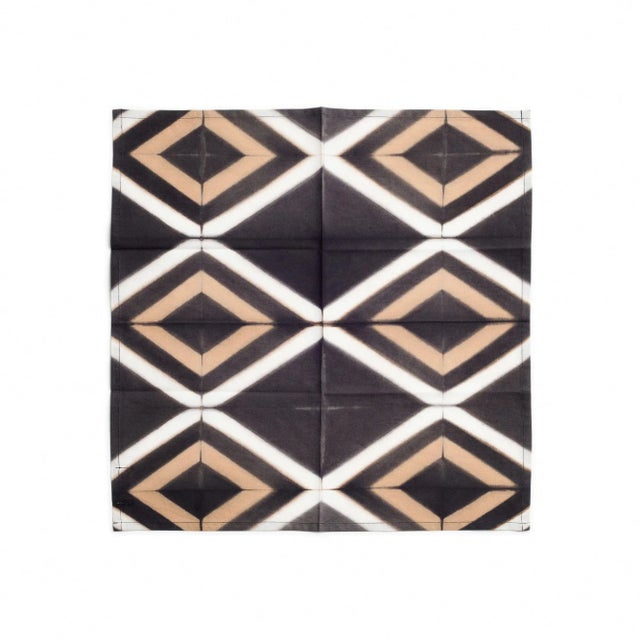 Tisa Black table napkin is a unique artisanal napkin. Created artistically and ethically by artisans in India using clamp...