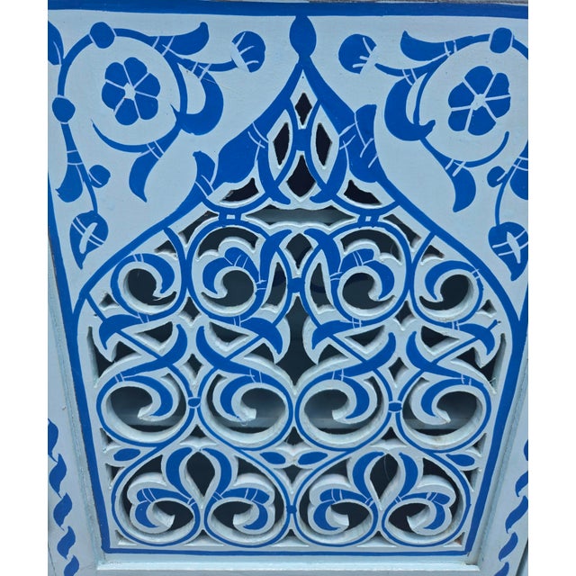 A beautiful hand‑painted Moroccan medicine cabinet / wall shelf from Morocco, standing approximately 22" tall, 18" wide,...