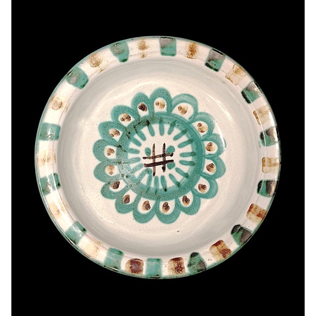 Robert Picault contributed to the revival of culinary ceramics by updating traditional local forms decorated with...