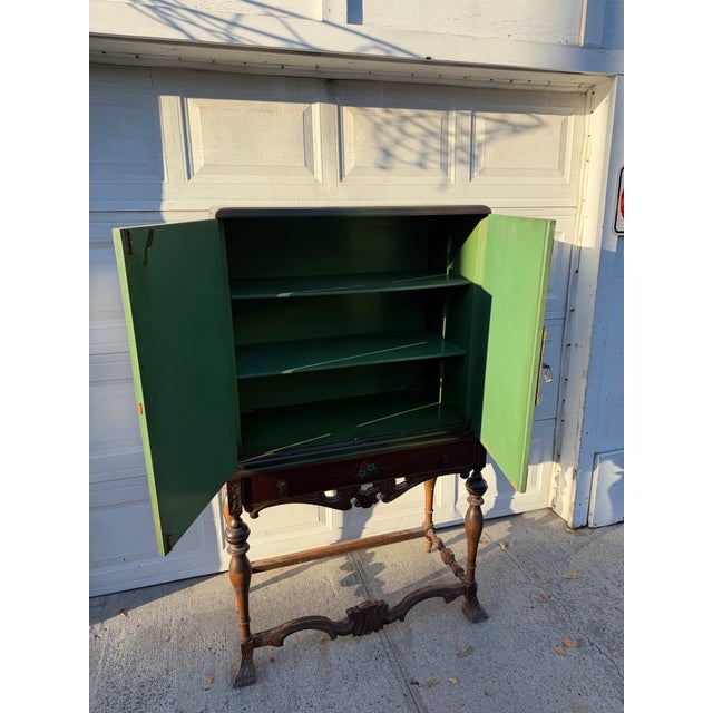 Vintage Chinoiserie Green Lacquer Cabinet With Hand Painted Asian Scenes and Ornate Carved Base For Sale - Image 11 of 12