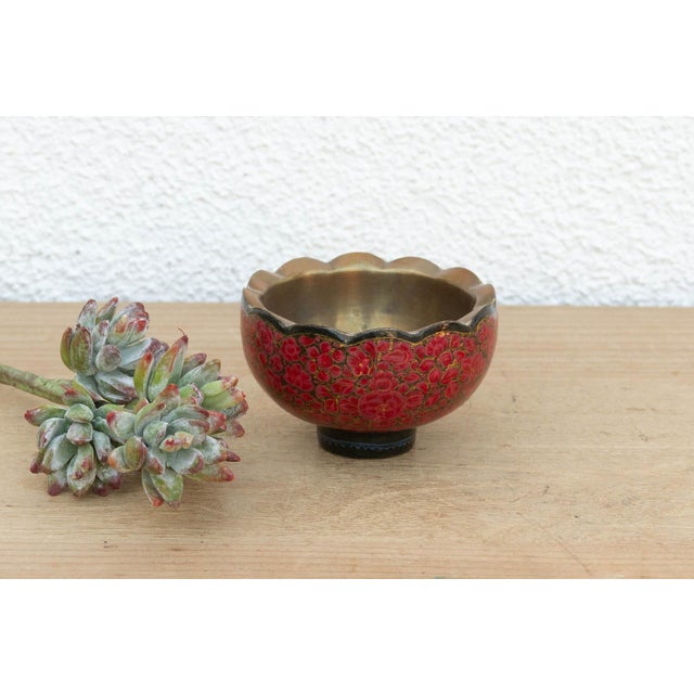 This petite vessel captures the romance of the Kashmir Valley in a compact form. Distinguished by its delicate scalloped...