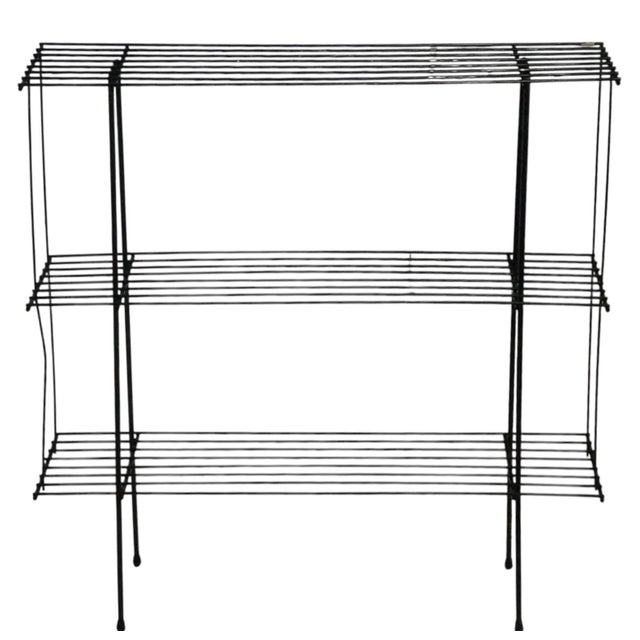 Classic three tier wire shelf constructed of repeating iron rods, in the manner of Weinberg, Umanoff etc, unsigned....