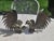 Collector's pair of vintage mid-century brass fighting rooster figurines, this pair features detailed, layered tail...