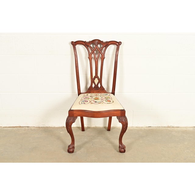 A gorgeous Chippendale or Georgian style side chair or dining chair In the manner of Baker Furniture USA, Circa 1980s...