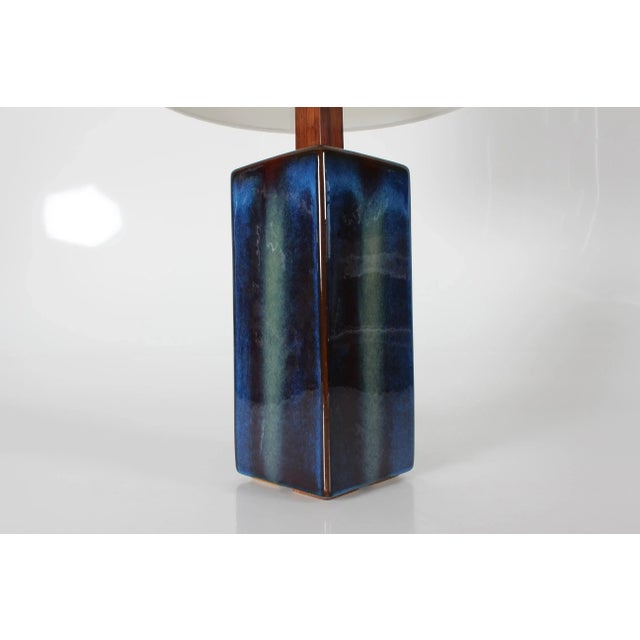 Tall sculpturel ceramic table lamp made by Søholm Stentøj, Denmark. Made circa 1960s. Decorated with midnight blue glaze...