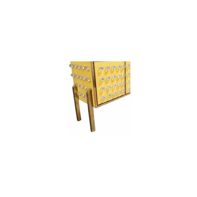 Contemporary Italian sculptural sideboard handcrafted in 2026 with butter-yellow glass, 120 clear fused Murano glass...