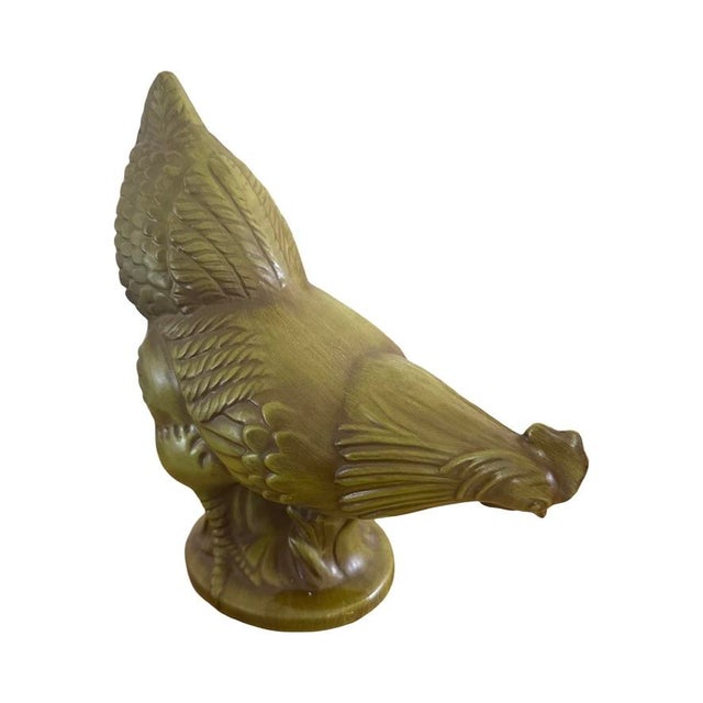 A beautiful vintage Royal Haeger standing chicken sculpture finished in the desirable Antiqued Avocado satin glaze. This...