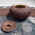 This mizusashi by Noma Gazan is a traditional water container used in the Japanese tea ceremony. Dimensions: height 12 cm,...