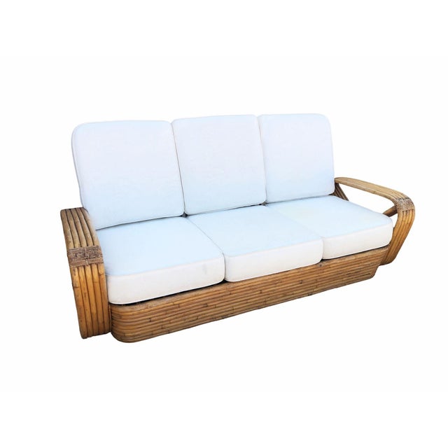 This rare, museum-quality five-strand square pretzel square-back three-seat sofa was designed by Paul T. Frankl using the...