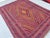 This bold Maimana kilim features a large concentric diamond medallion built from radiating zigzag bands in rich red,...