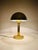 A beautiful mid-century table lamp made in Italy in the 1960s. It is fascinating with its beautiful shade. The table lamp...