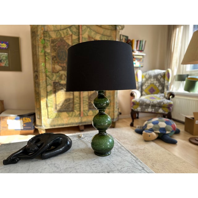 This distinctive table lamp was produced by the renowned German manufacturer Kaiser in the 1970s, a company celebrated for...
