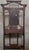 Striking antique hall tree in the late Victorian taste, featuring an unusually tall and airy architectural frame with...