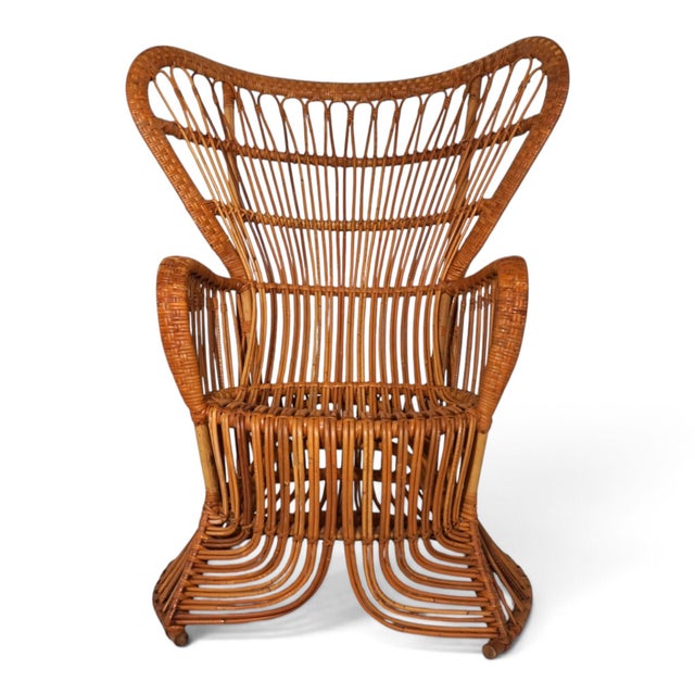 with its imposing, fan-shaped backrest and sculptural silhouette, this extraordinary Peacock Throne by Rohé Noordwolde is...