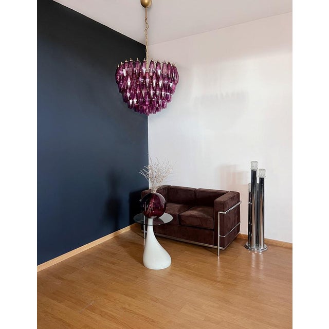 It sounds like you have a stunning piece of art with that Italian pendant light! The combination of 111 amethyst Murano...