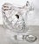 This hand cut lead crystal decanter sits at an angle like a spinning top creating an interesting style to your bar....