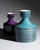 Pair of Rosenthal Studio-Line porcelain vases designed by Hans Theo Baumann in 1964. The related bottle forms are finished...